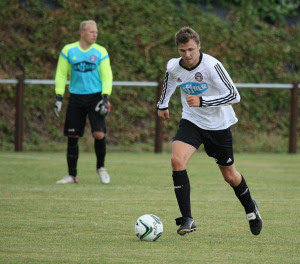 Luke Askey looks to kick-start another Alleynians attack