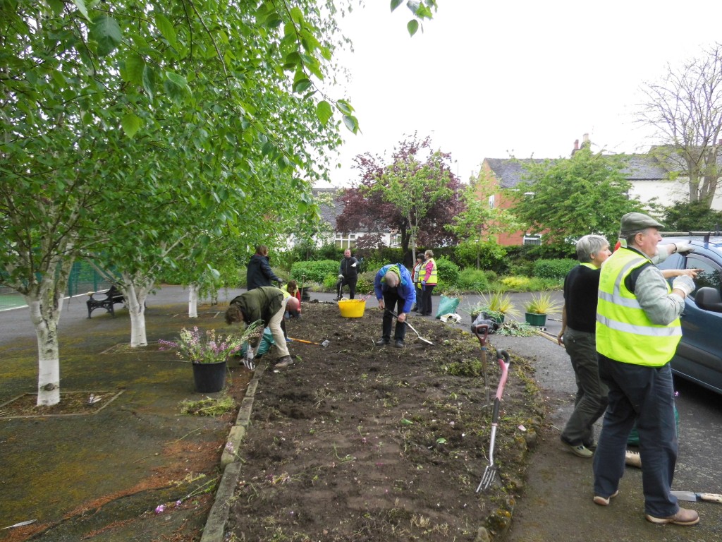 Stone in Bloom volunteers working on the new raised beds in Stonefield Park