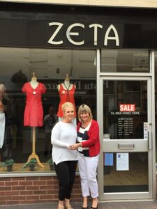 Sue, right, welcomes Tracy to Zeta