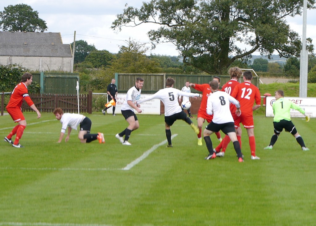 A shot from Askey is cleared off the line