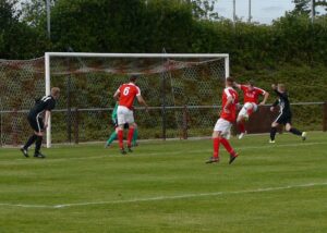 Alex Kay (11) Header cleared off the line 2