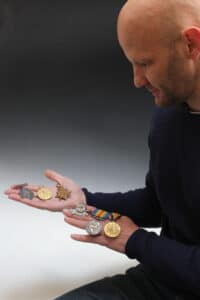 Dave Eglington with the medals