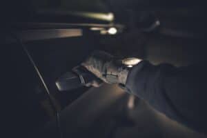 Thief Hand on a Door Handle