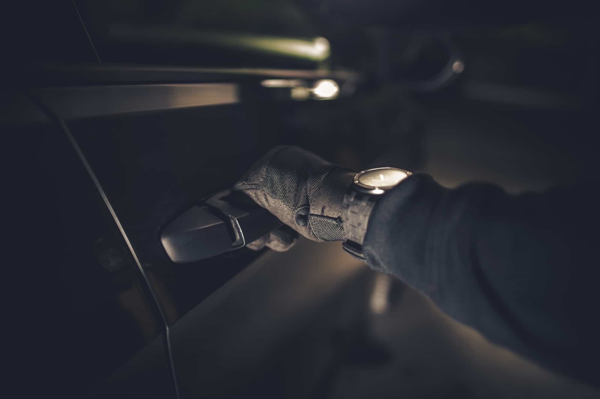Thief Hand on a Door Handle