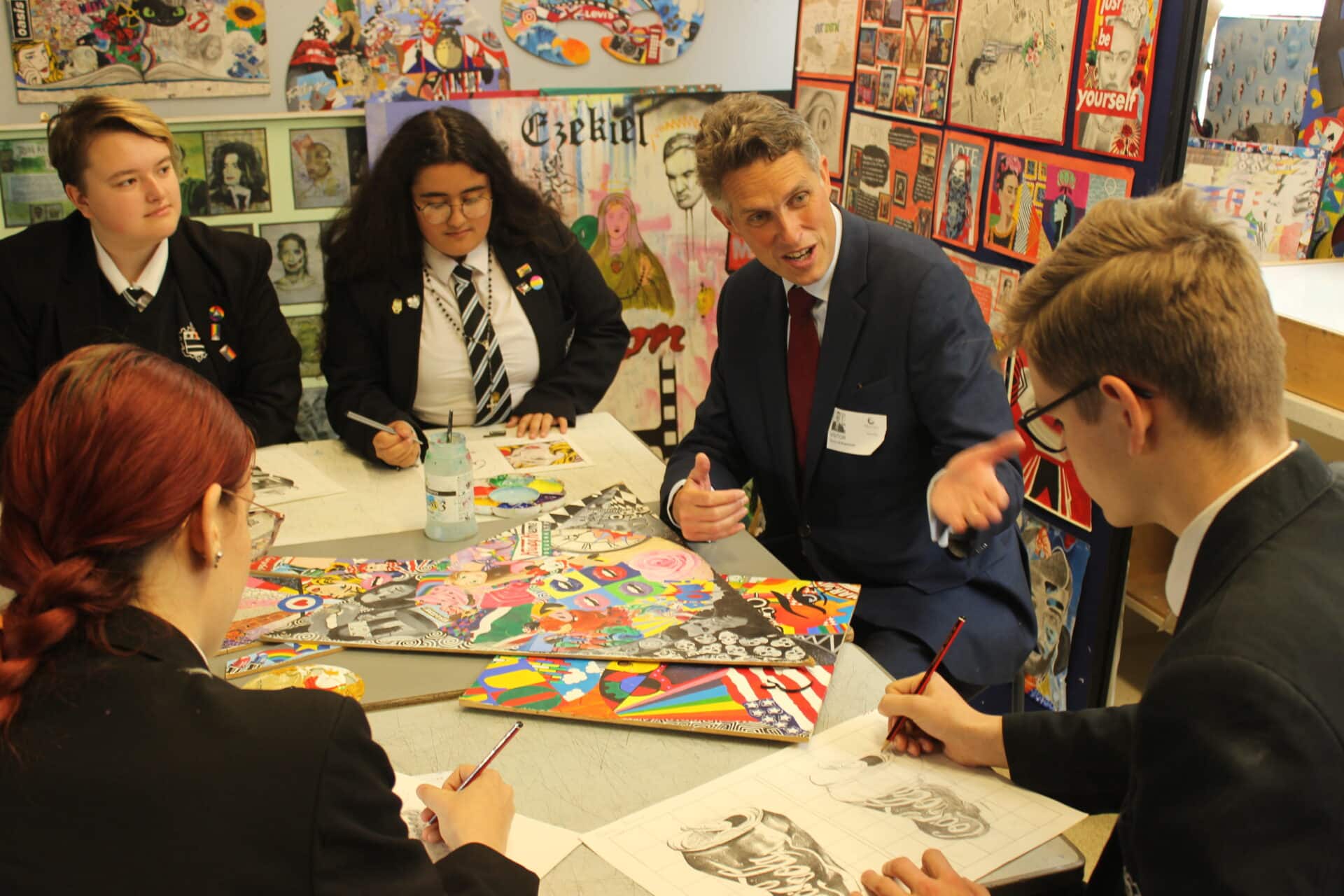 Sir Gavin with pupils from Stone's Alleyne's Academy