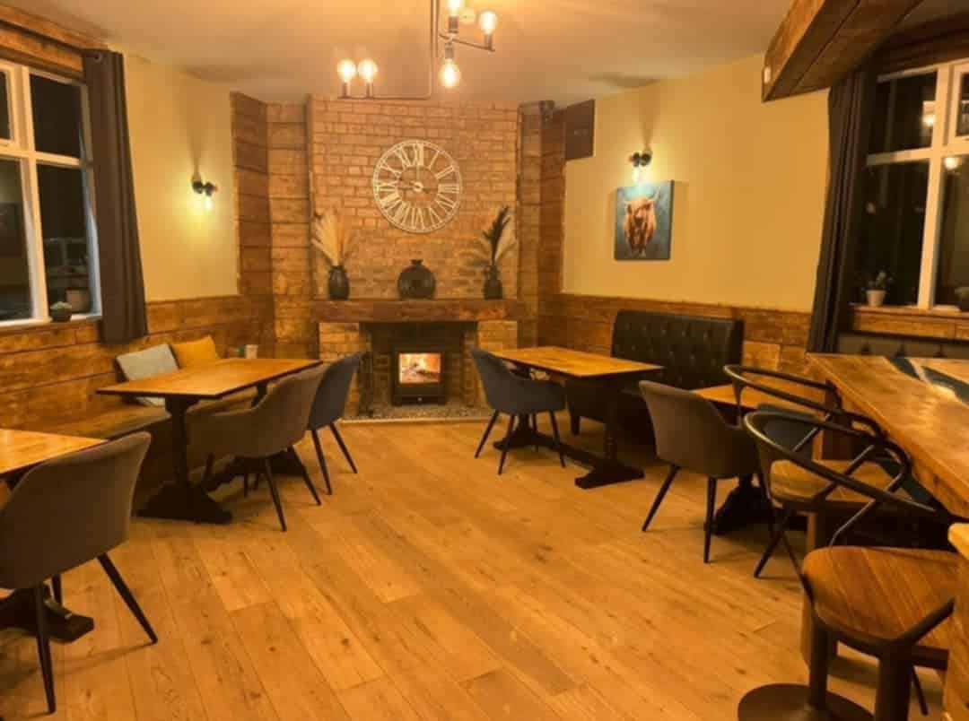 Inside the Butchers Block in Stone - the fire roars ready to welcome people to A Little Bit of Co-Working space