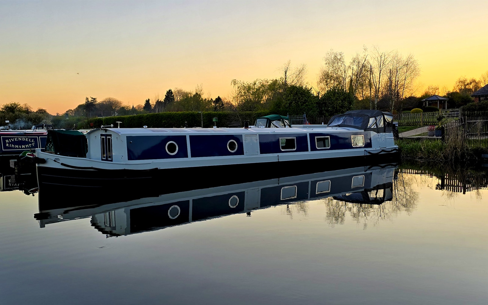 Dragon Fly in Aston Marina with a sunset in the background