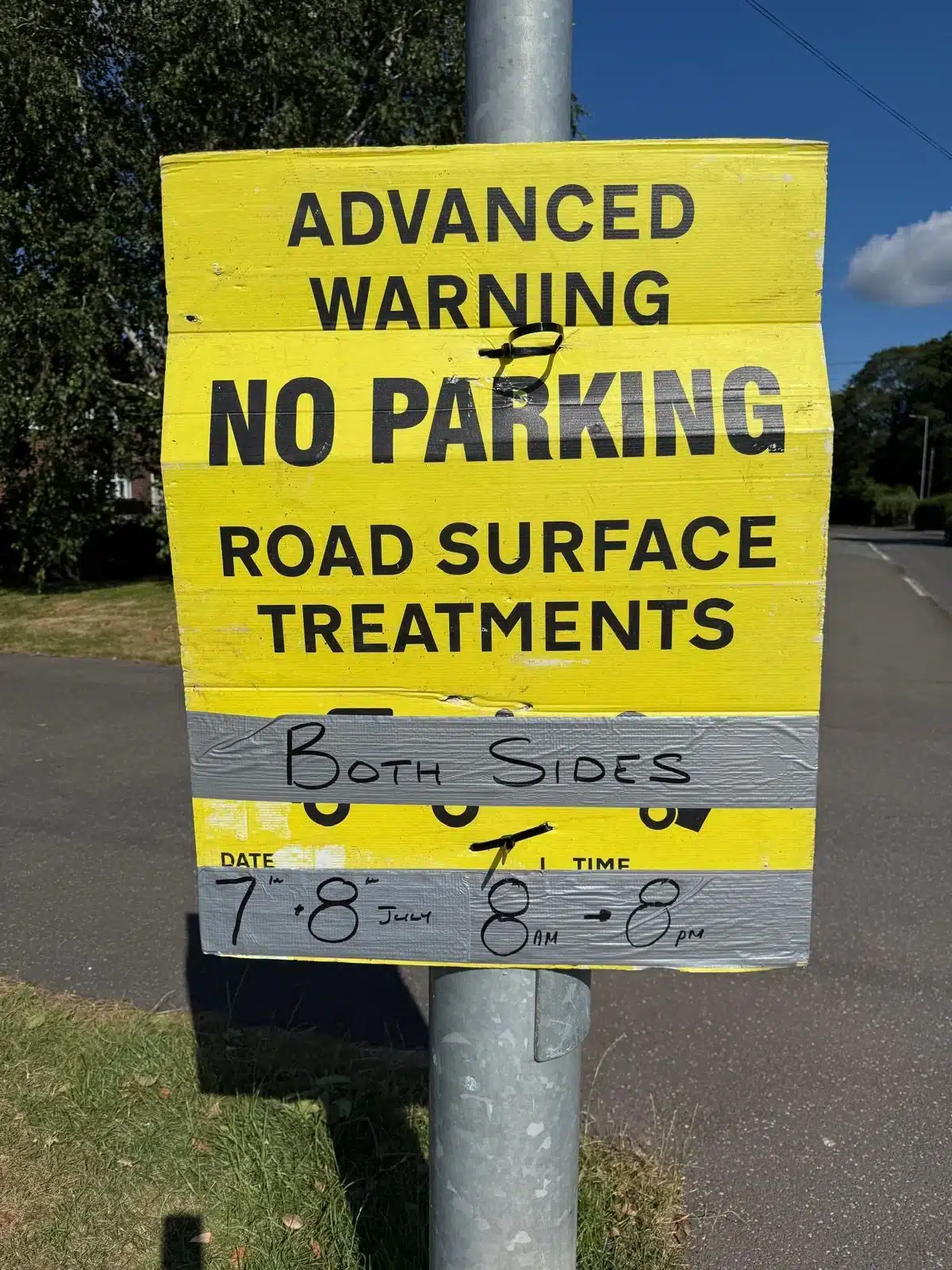 Yellow road sign warning of no parking on both sides for road surface treatments on Lichfield Road, 7th–8th July 2025