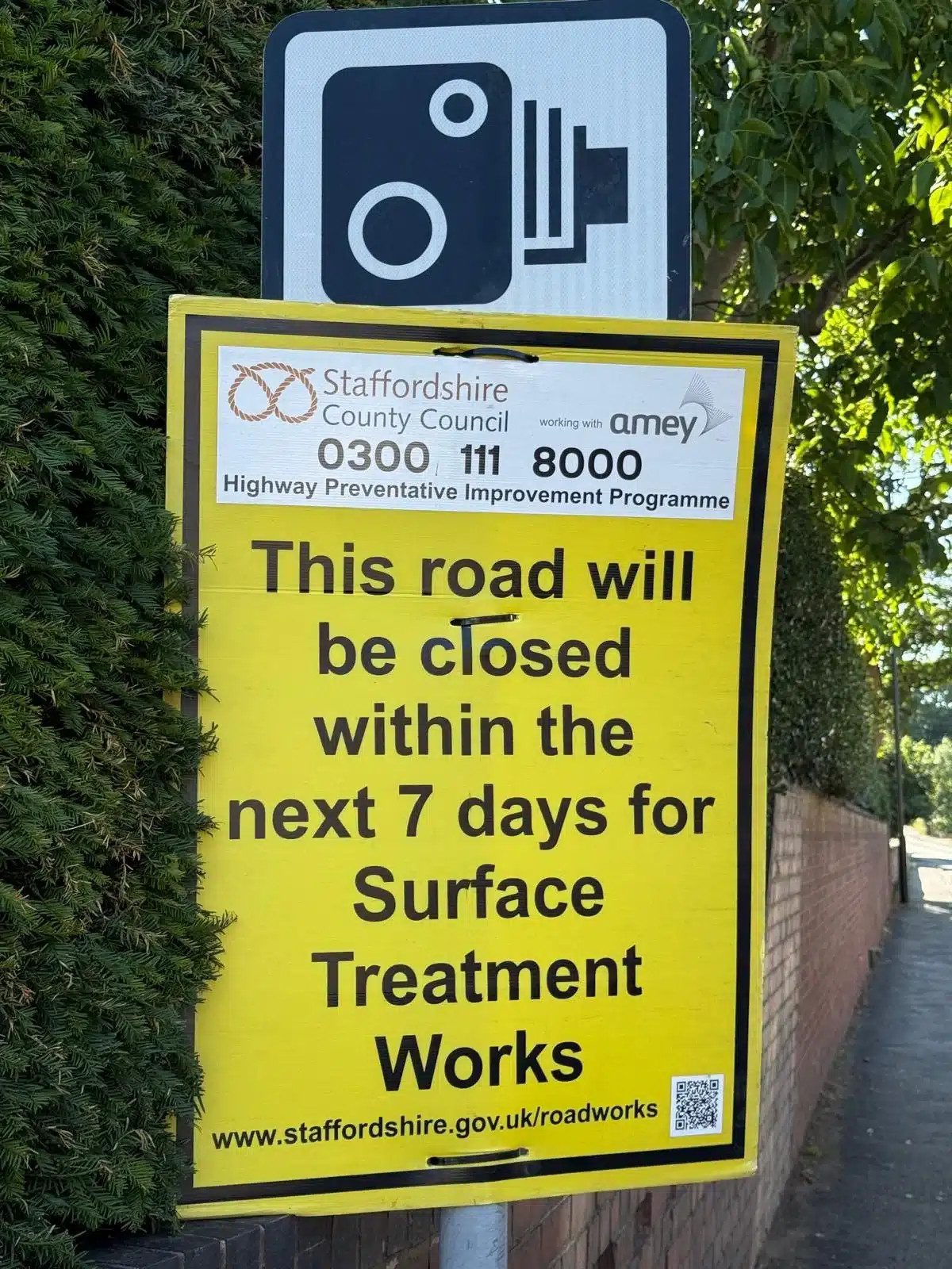 Staffordshire County Council sign announcing upcoming road closure for surface treatment works in July 2025