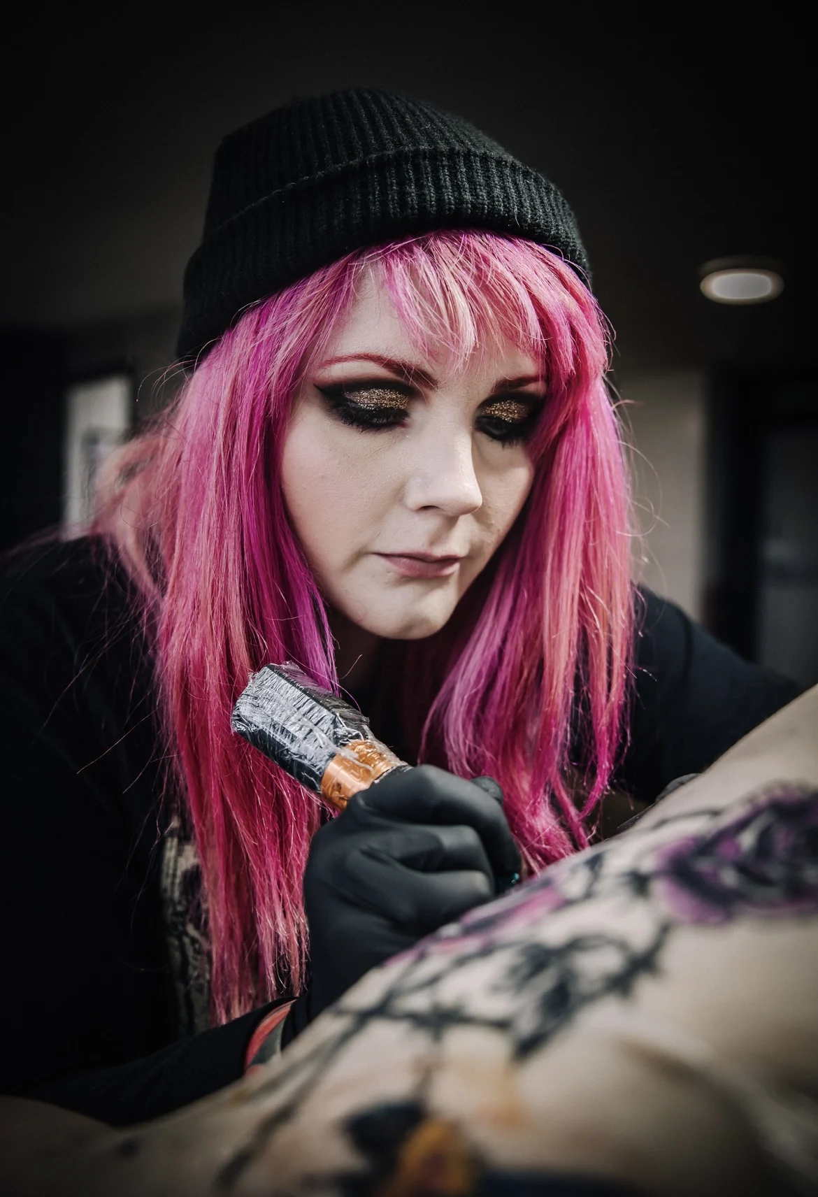 Tattoo artist Lottie Mellor working inside her new Stone studio, Lottieinks, on Whitebridge Estate.