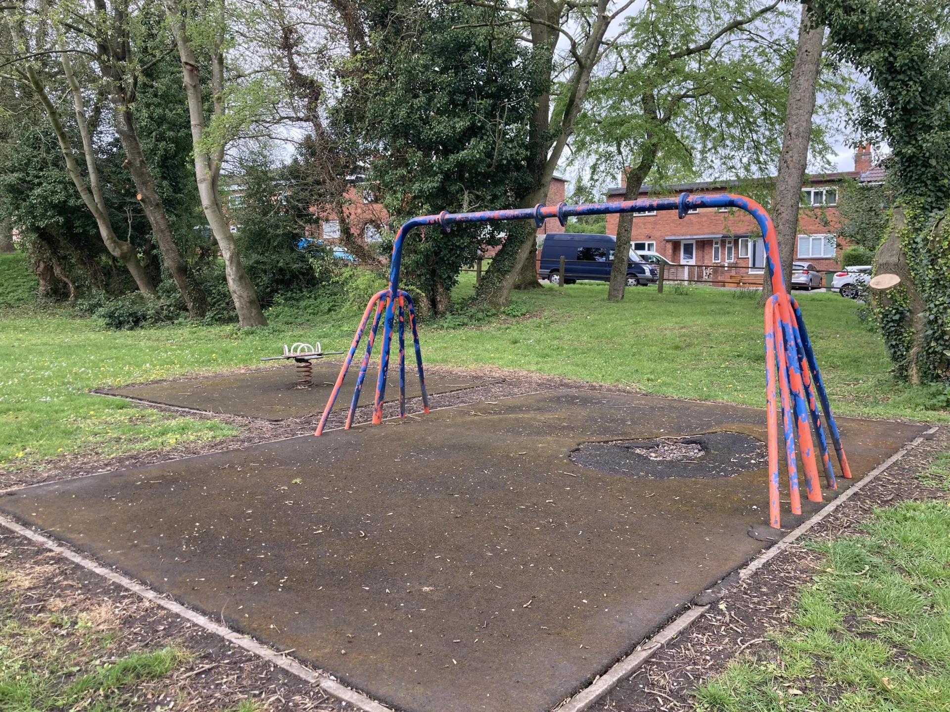 Old play equipment and worn surfacing at ABC Park, also known as Walton Playing Fields, in Stone.