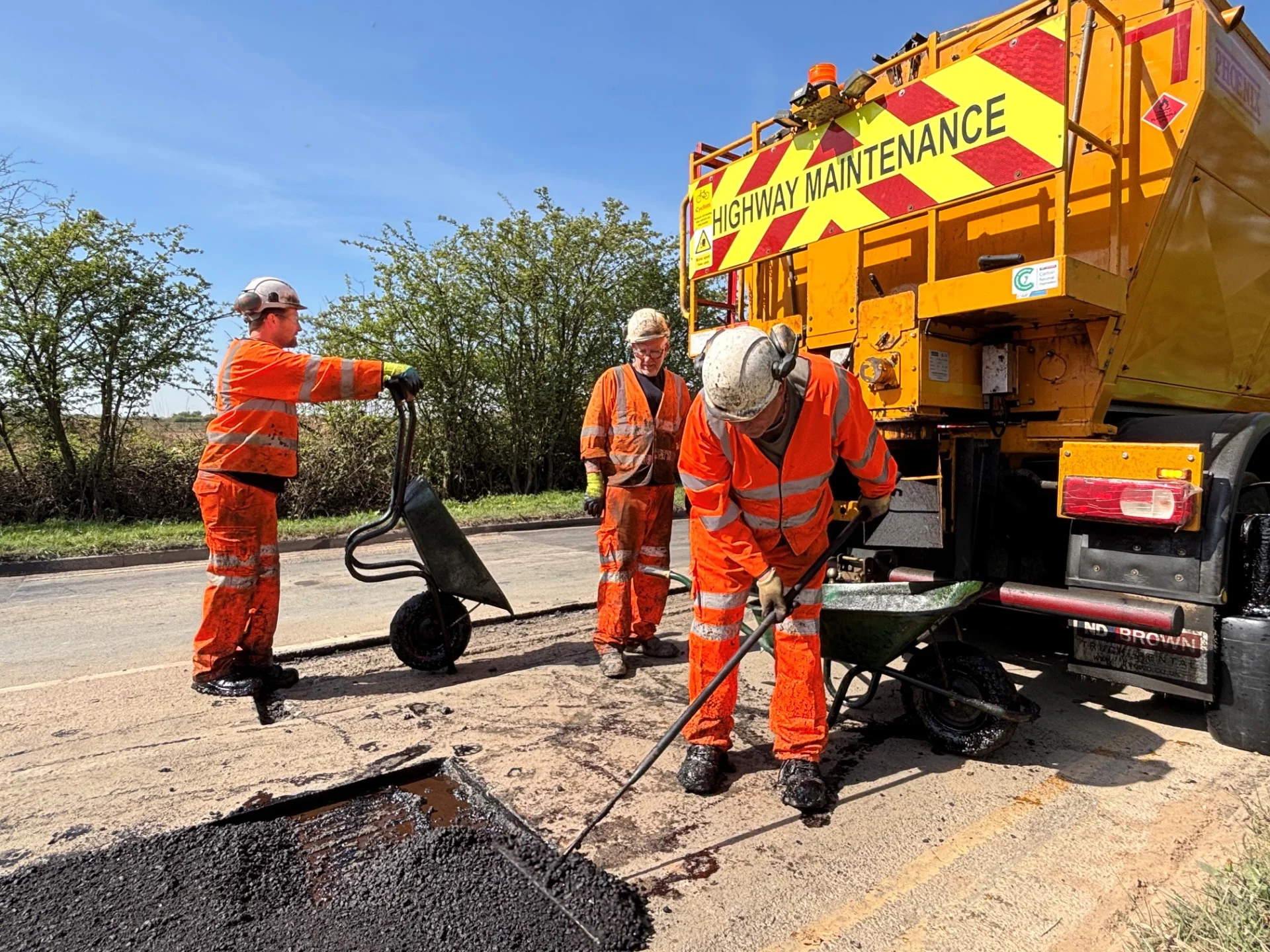 Highways crews working next to a hotbox