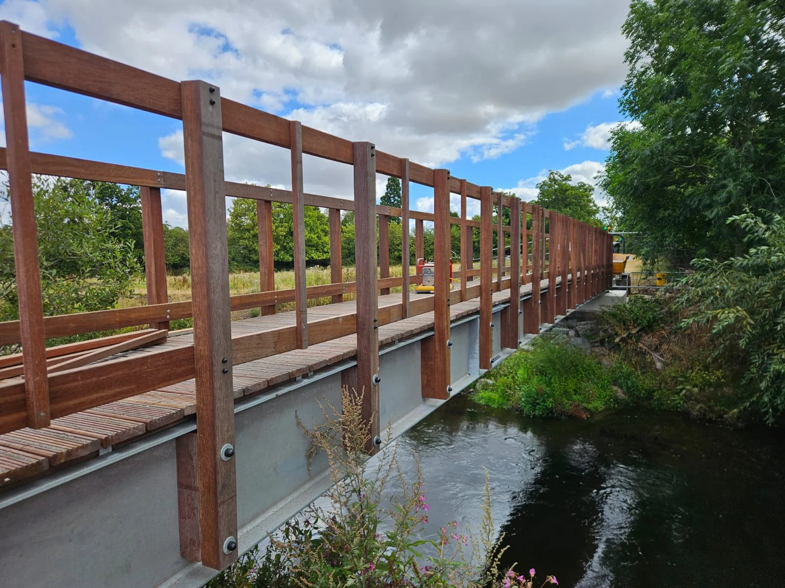 New wooden sided footbridge over the river on Sandon and Burston Public Footpath 36 near Stone.