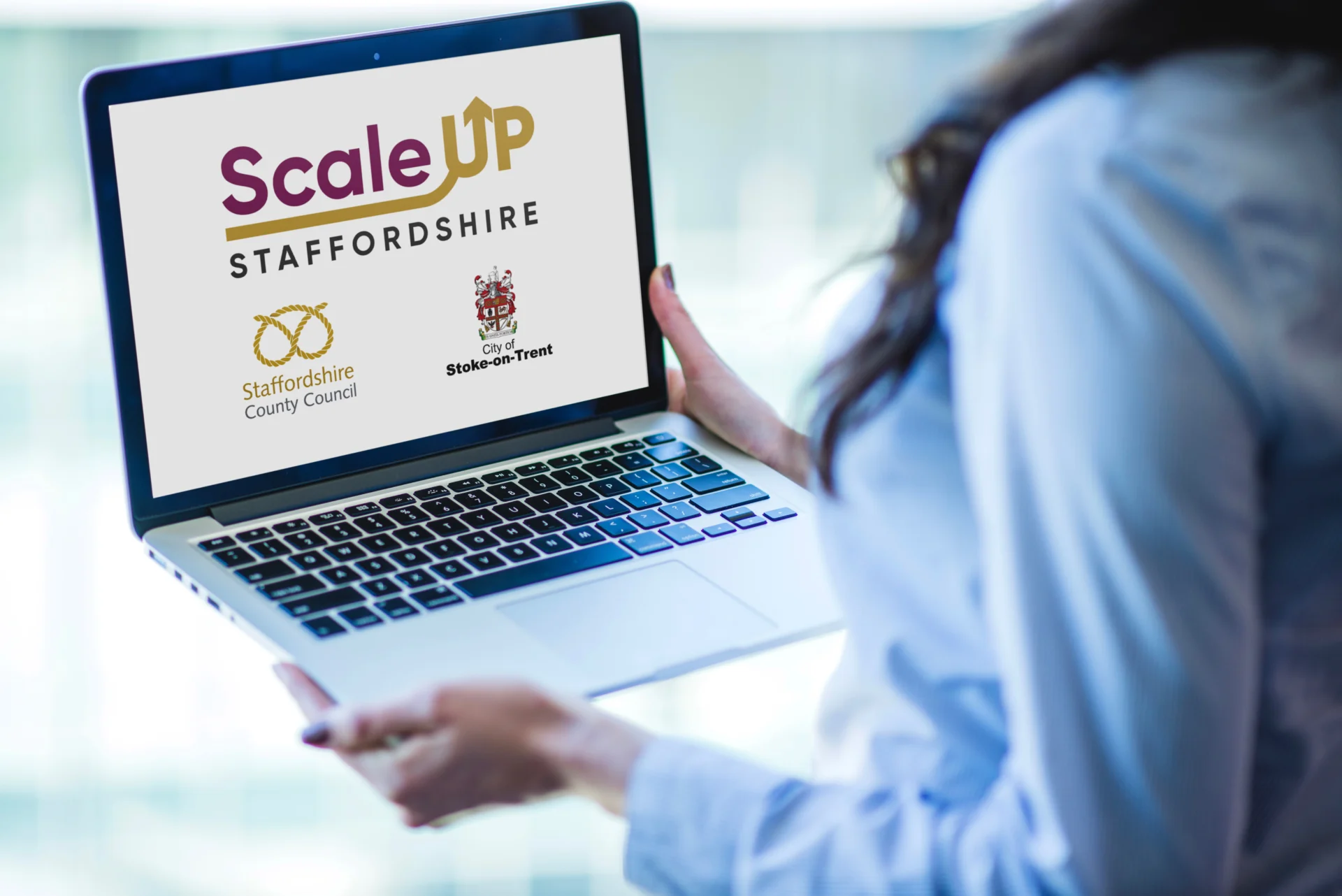 Scale Up website on a laptop